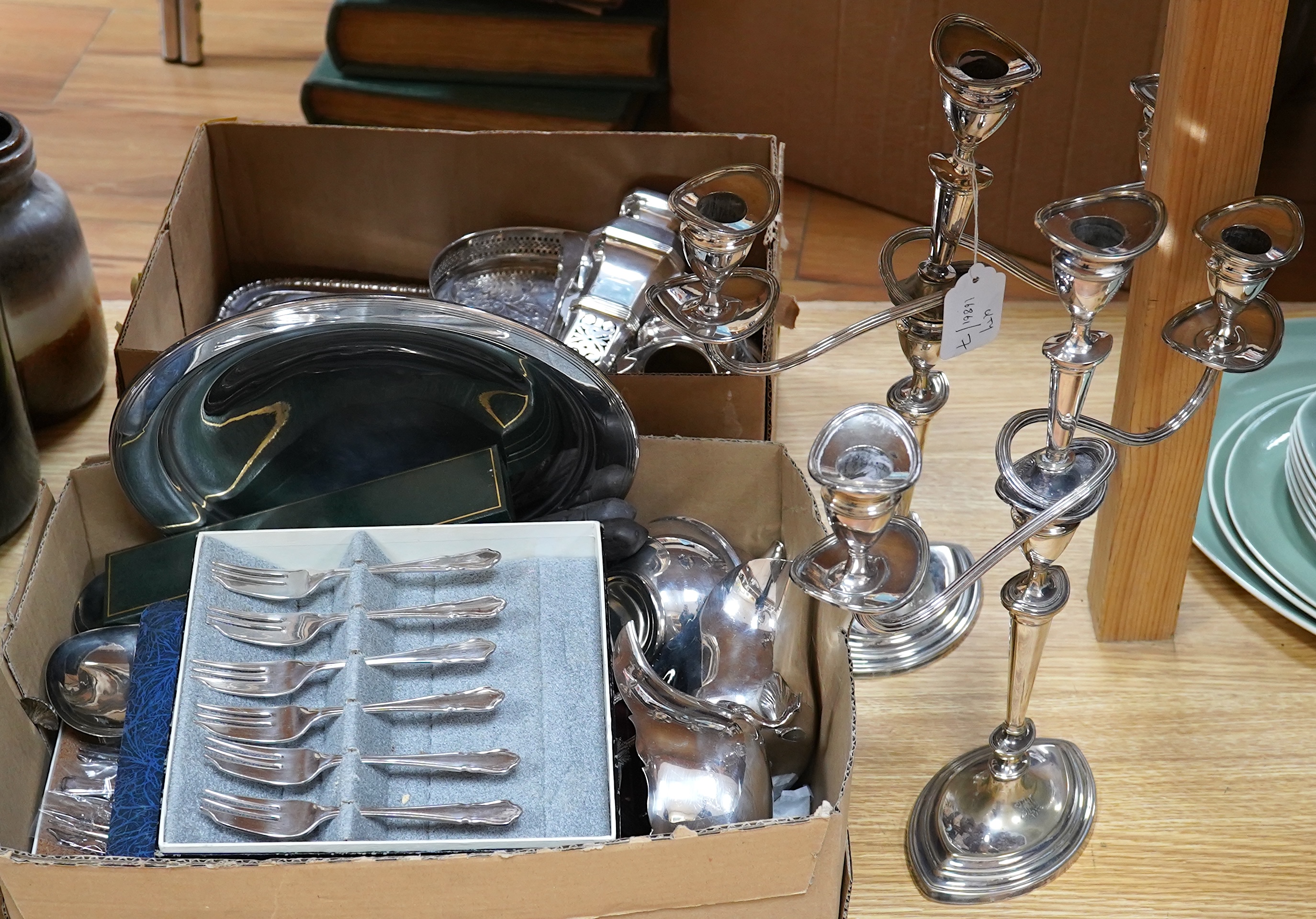 A quantity of assorted plated ware including a pair of three light candelabra - 39cm high. Condition - all fair to good